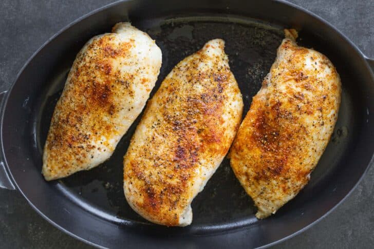 Baked ahead chicken breast on a platter