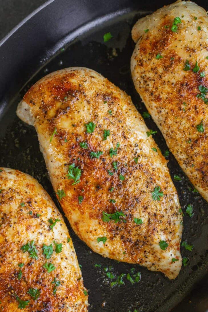 Up close juicy baked chicken breasts