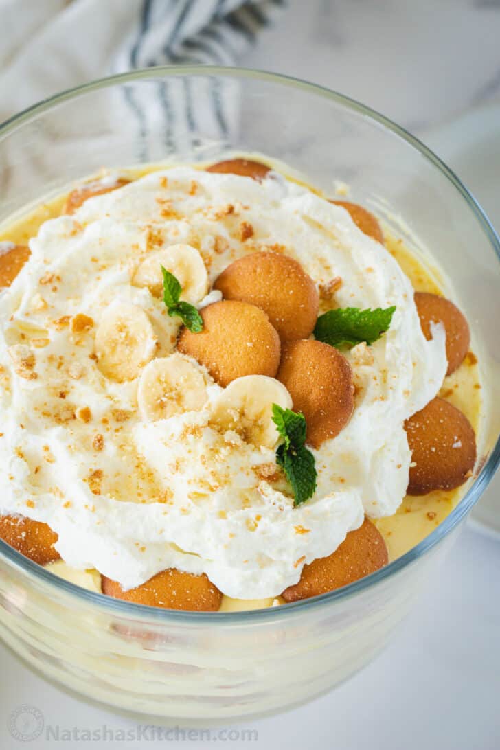 The top of banana pudding in a trifle bowl.