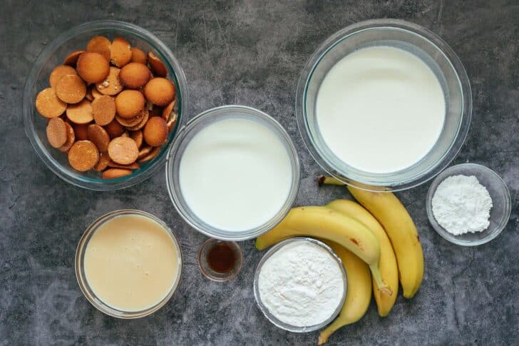 Ingredients needed for banana pudding recipe in ramekins.