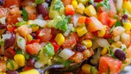 Cowboy caviar ingredients in a large bowl ready to serve with a spoon